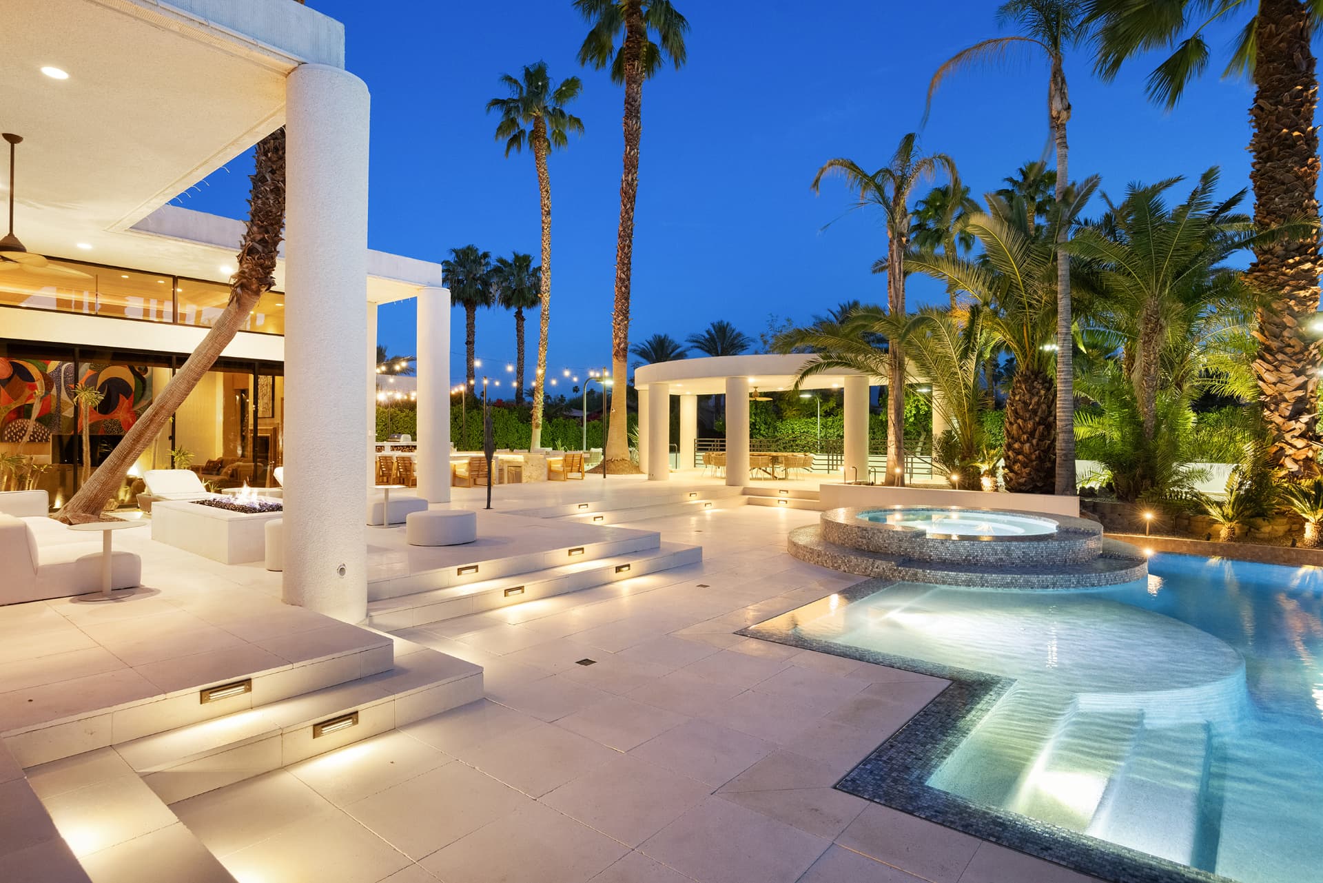 Pool and terraces at 3 Mozart Lane at dusk