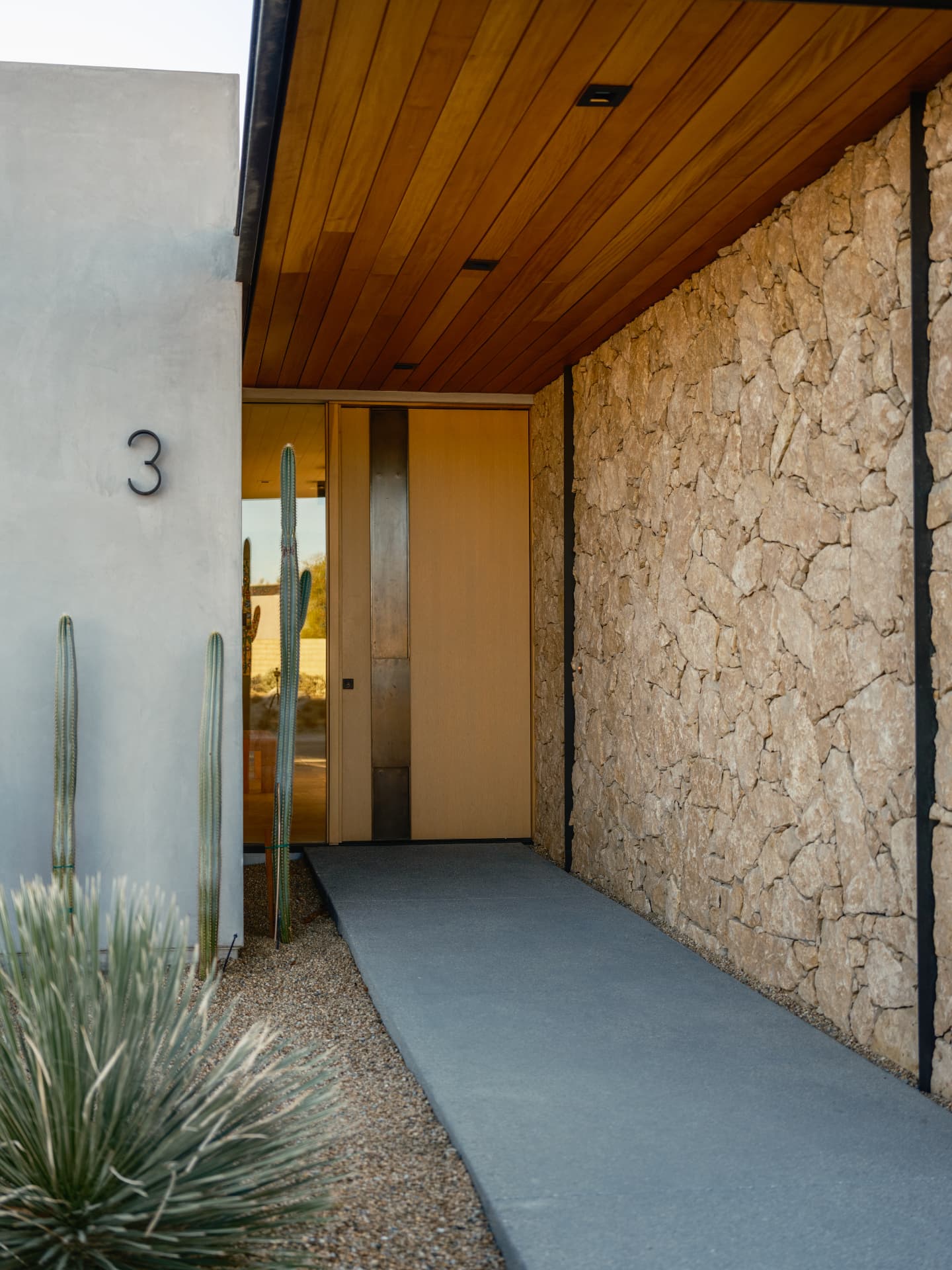Stone-walled entrance at 3 Echo Lane