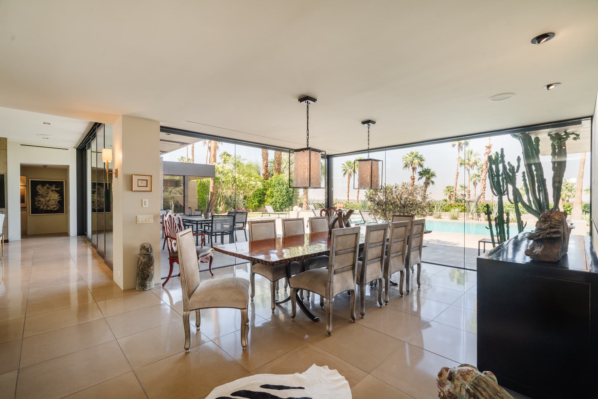 Dining room opening to the pool at 70257 Calico